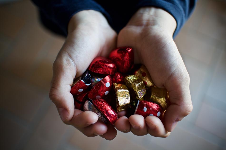 bright christmas toys in hands