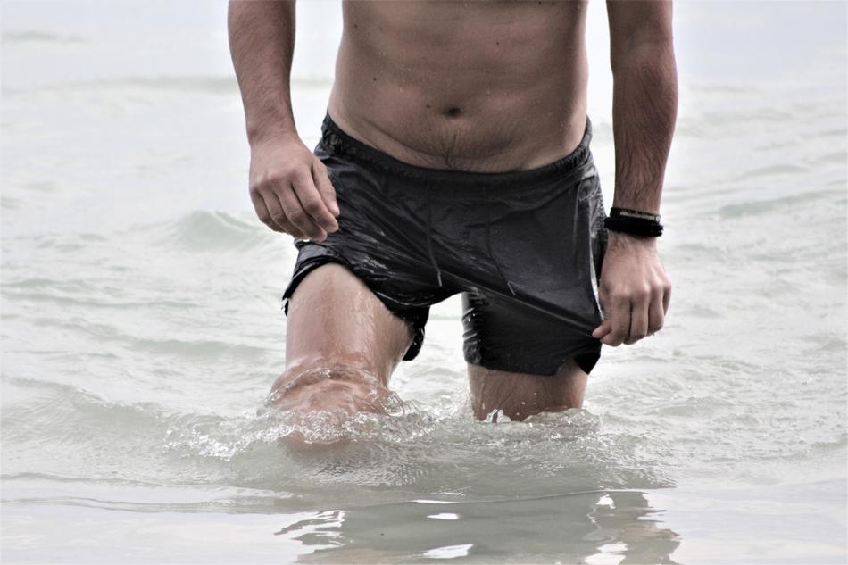 man in Water on Beach