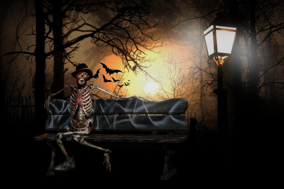 Skeleton, sitting on the bench with graffiti, near the lantern, among the trees and bats, at background with Moon