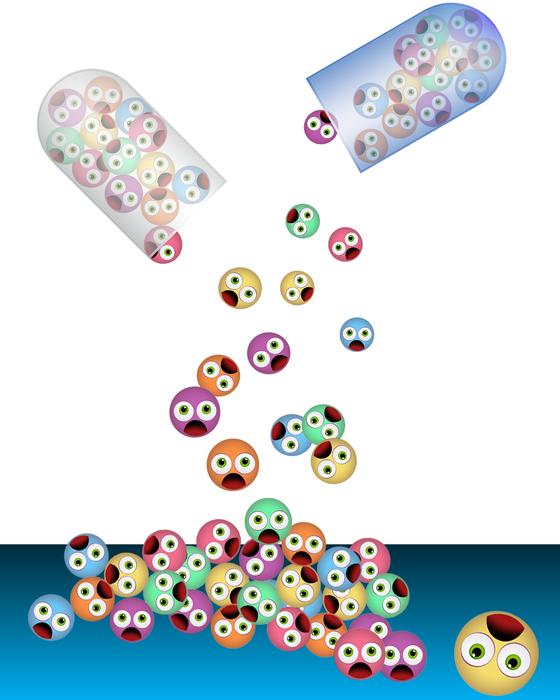 Colorful pills spilling out of the containers