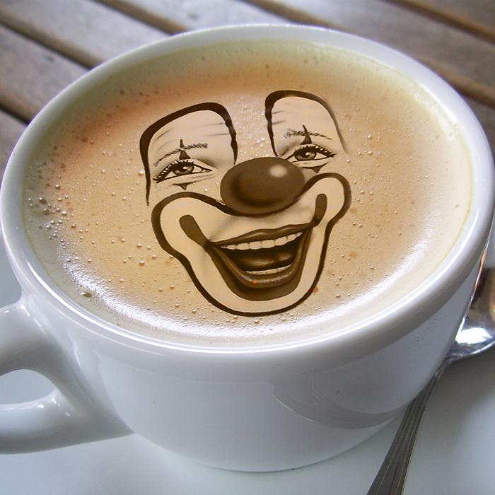 clown face on cup of coffee