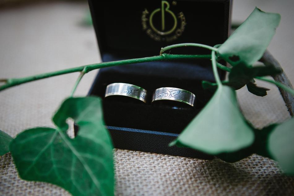Wedding Rings and green leaves