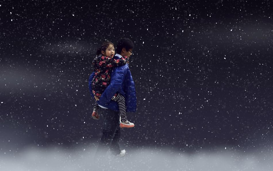 Girl on the uncle's back at colorful sky background