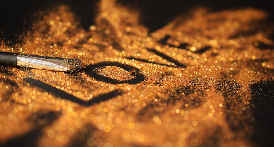 inscription love in gold on black