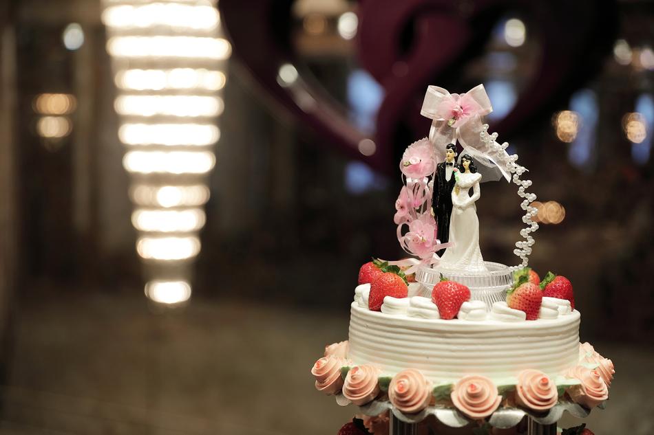 wedding cake with decorations on blurred background