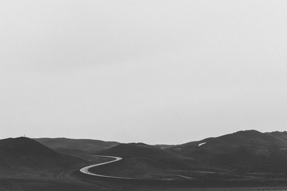 road among the hills in black and white background