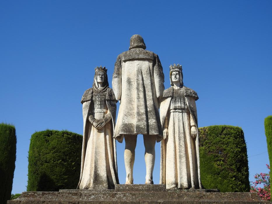 sculpture of people at the wedding against the blue sky