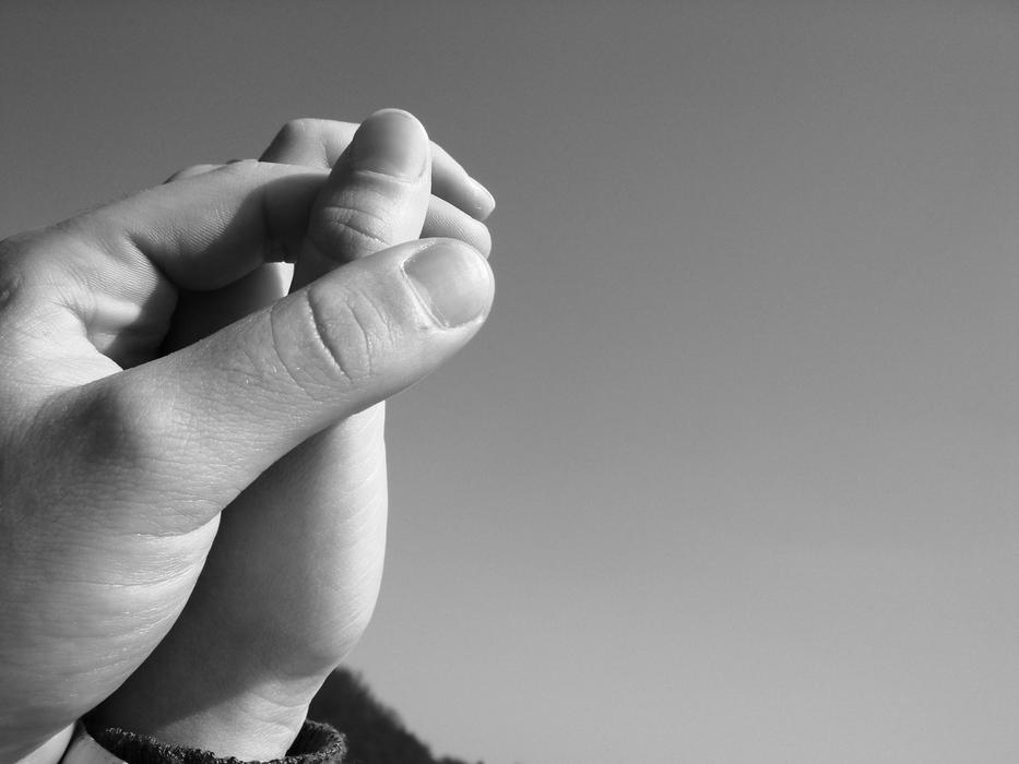 hands of a couple in love close-up