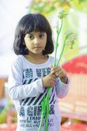 Boy Girl Child with flowers