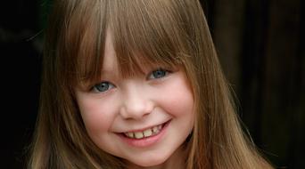The Little Girl A Smile Bangs