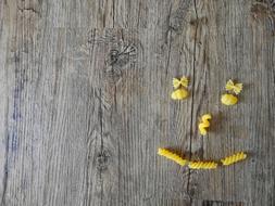 pasta noodles on wood background