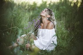 Lovely girl in Nature Grass