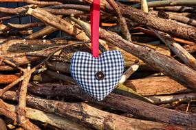 checkered heart on a branch