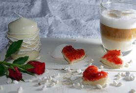 festive breakfast with rose and candle