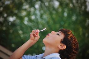 Boy Child with soap bubbles