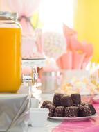 chocolates and orange juice on the festive table