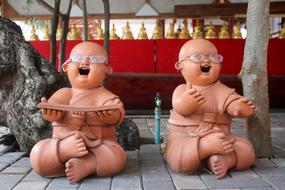 Stone Buddha Figures on street