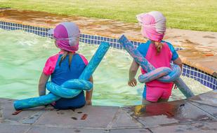 Playing Children in swimming Pool
