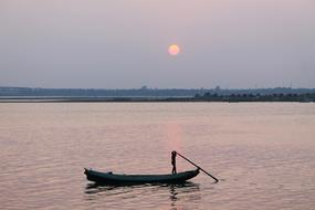 Boat Man sunset
