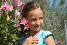 smiling Girl Child in floral garden