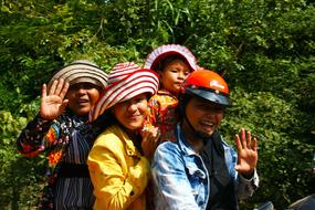 Women Motorbike Ride Smiling
