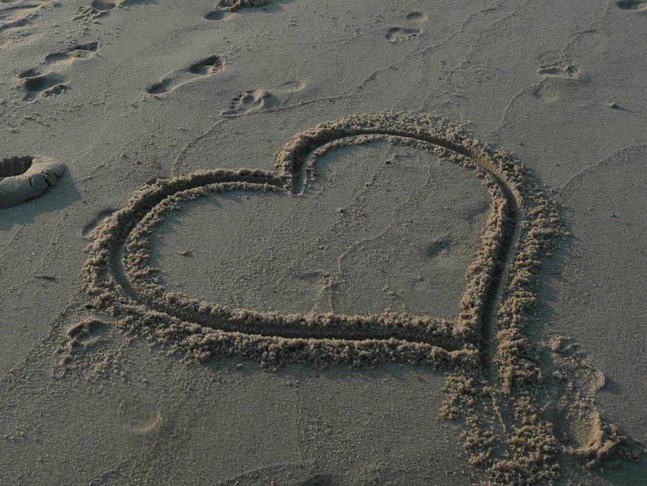Heart Thanks symbol on sand