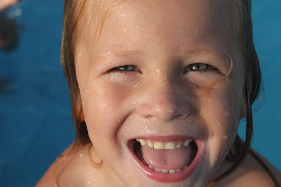happy wet girl in the pool