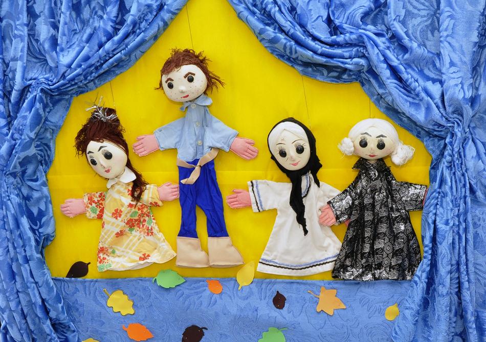 puppets on stage in the theater