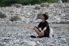 boy Playing with Stones