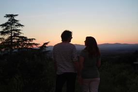 Couple Love looking at Sunset