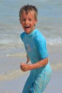 Child Boy having fun on beach