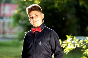 Young boy with red Bow Tie