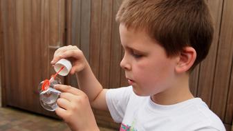 Boy and soap bubble