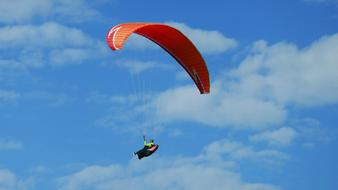 man on parachute in the sky