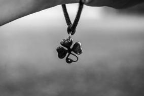 Black and white photo of Happiness Bracelet Clover figure