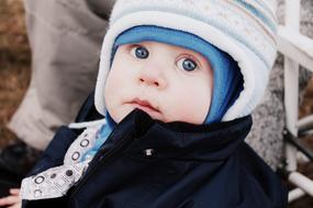 Blue-eyed surprised child