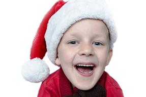 Christmas hat wearing boy
