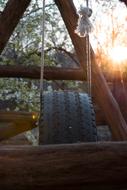 large wheel suspended on a rope