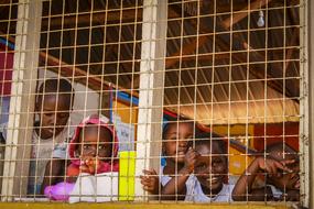 cheerful children at the window