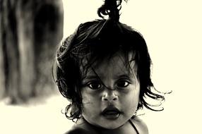 monochrome photo of small child look