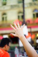 Woman's hand with red nail polish