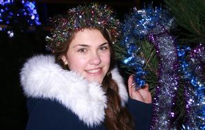 Girl by the Christmas Tree