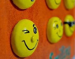 Smilies hanging on fabric