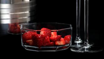 Sweet strawberries in a glass plate