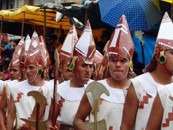 people in carnival costumes