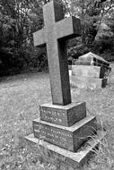 stone tombstone with cross