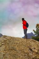 Man in a red jacket on the mountain