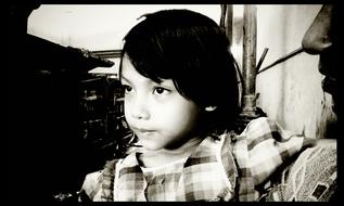 monochrome picture of small child girl face