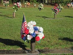 monuments with flowers nearby