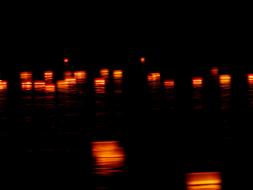 Reflection of lanterns in black water